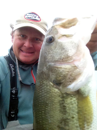 Kurt Dove with a bass catch on Lake Dardanelle