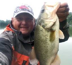 Photo of Kurt Dove and his catch on the Chesapeake Bay